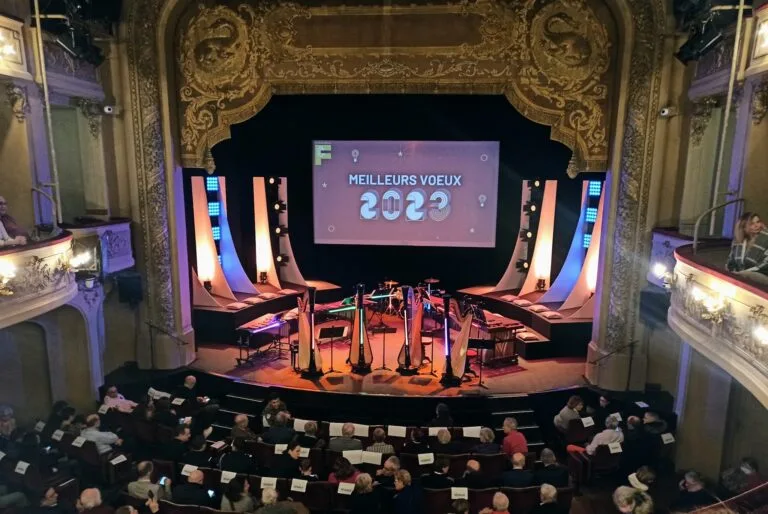 2023 New Year’s reception in a decorated theatre with an audience