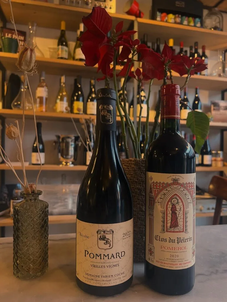 Bottles of Pommard Domaine Fabien Coche and Clos du Pèlerin Pomerol at the Maison Sumac bar